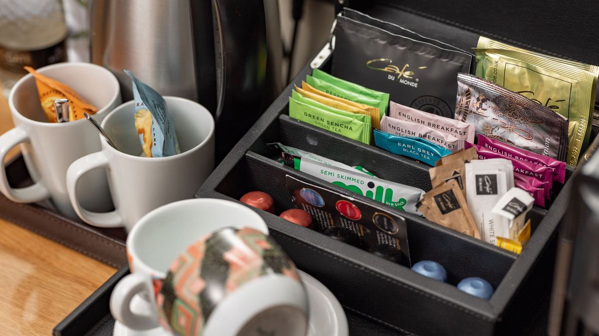 An in-room coffee station at Ennios